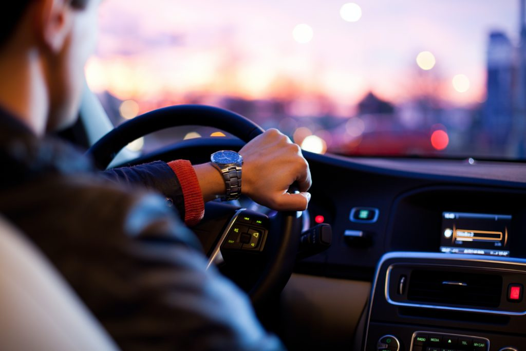 Graphic of person driving car representing Class B ELDT Theory Study Guide