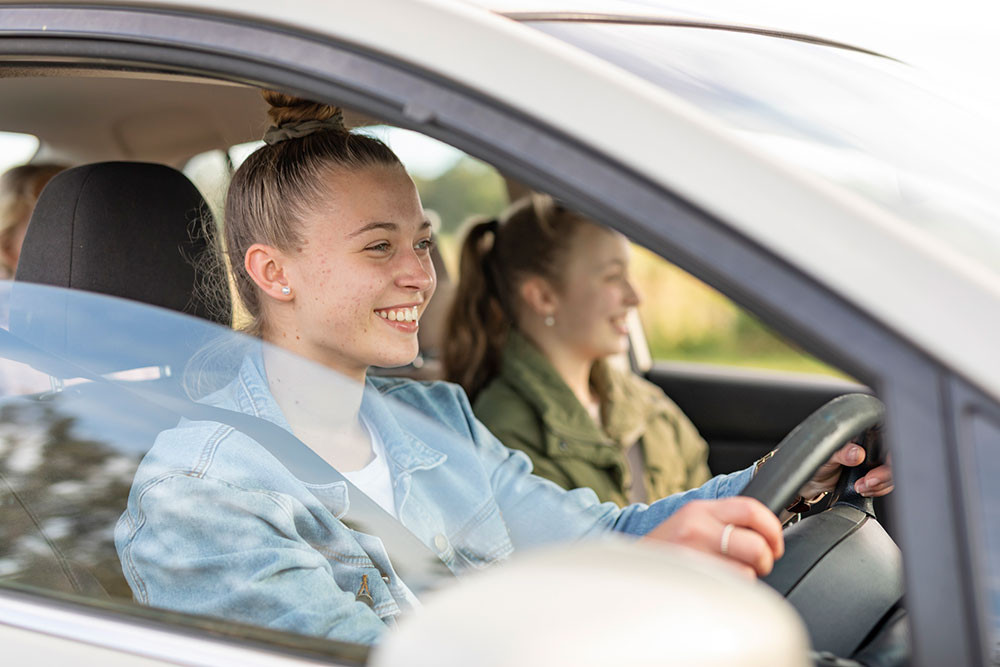 Student driver learning safe driving techniques with an instructor from Get Drivers Ed