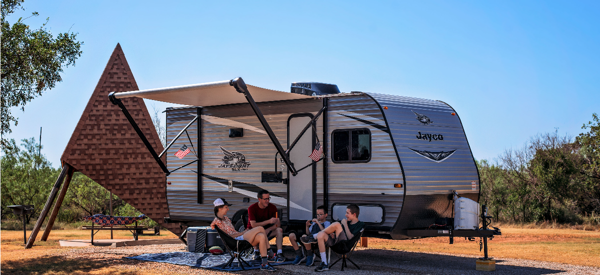 Adventurous spirit setting out in a mobile home, equipped with knowledge from Get Drivers Ed.