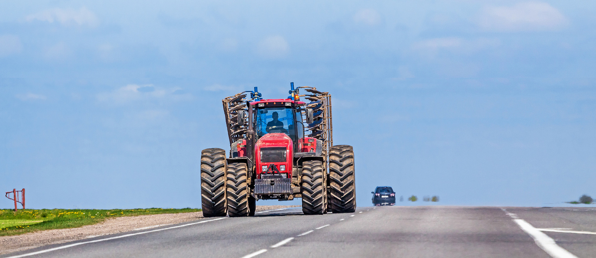 Farm Vehicle and Car Sharing Road