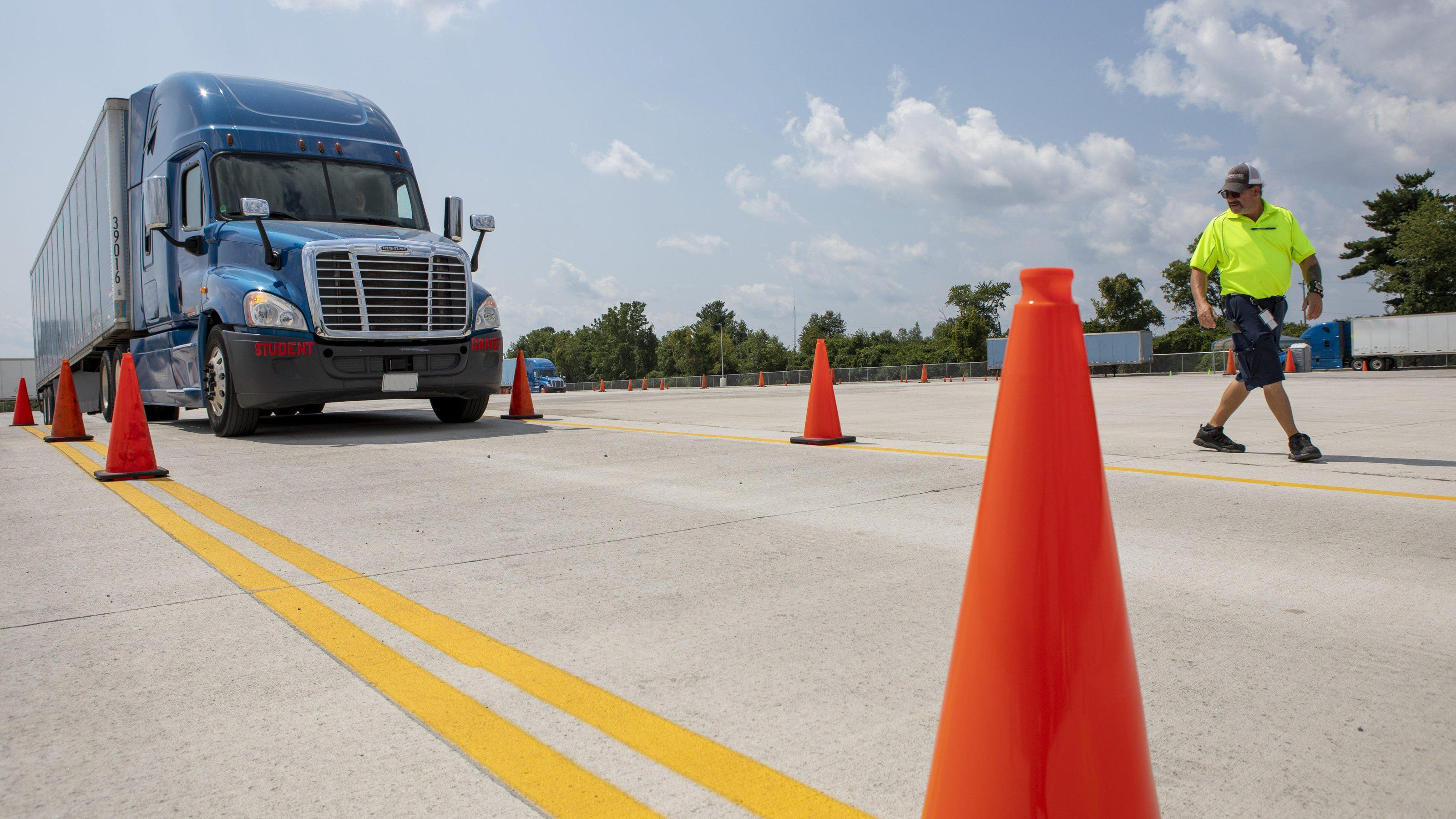 Truck driving student learning with Get Drivers Ed’s simulator for practical training.