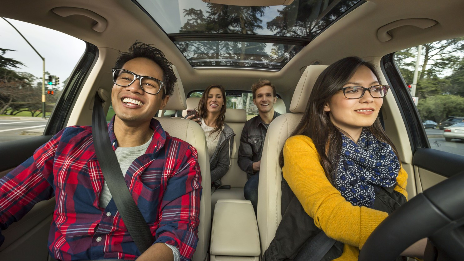 Group of people carpooling to work, reducing costs and emissions with Get Drivers Ed