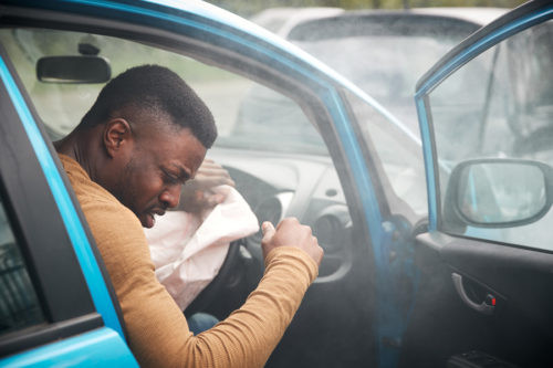 Driver reviewing vehicle safety checklist, trained by Get Drivers Ed.