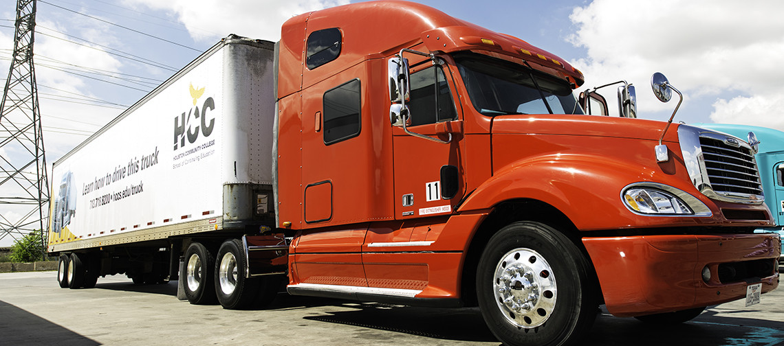 Aspiring CDL driver studies with Get Drivers Ed materials, ready for a successful career in commercial driving.