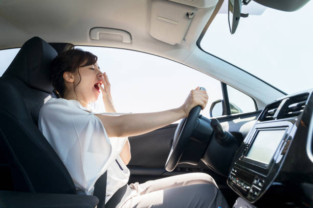 Driver staying alert while driving on the road.