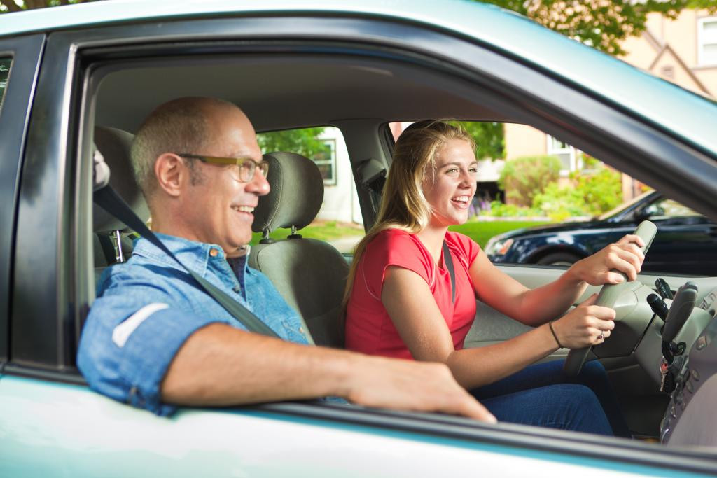 Parent and teen practicing driving together with Get Drivers Ed's Parent-Taught Drivers Ed course.