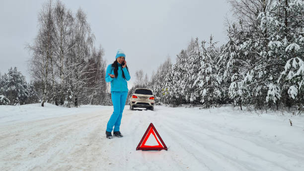 Image of a car cautiously navigating icy roads