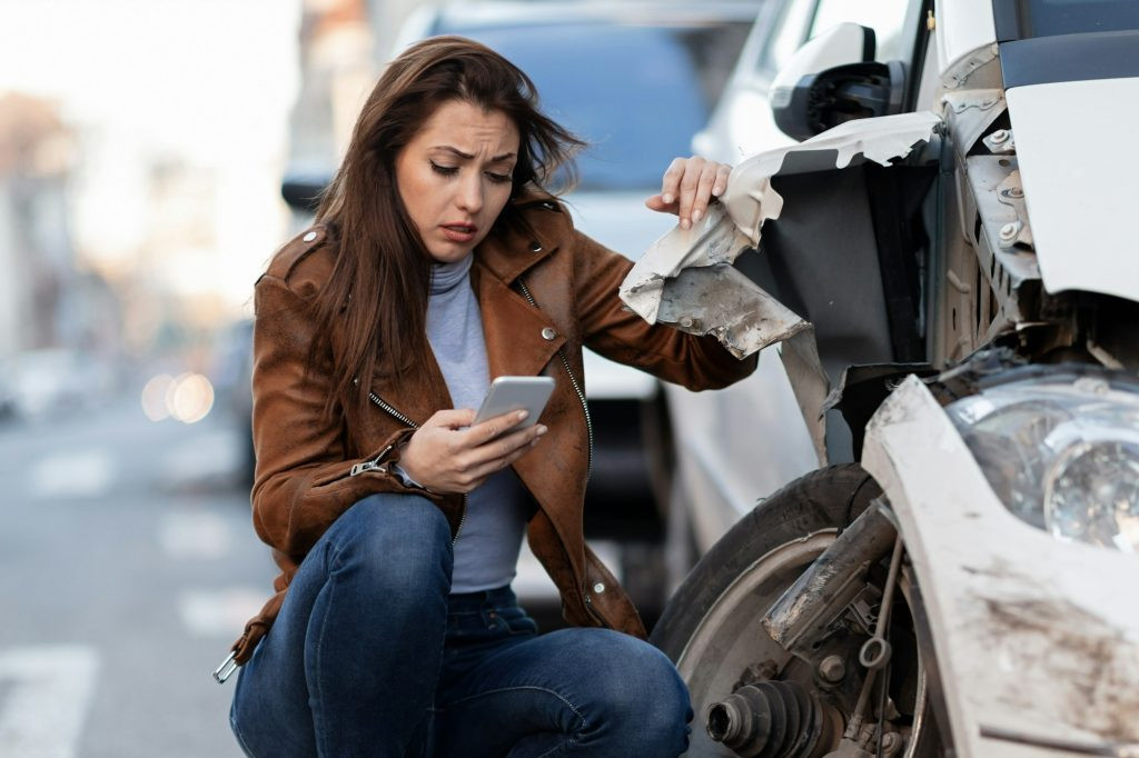 A driver feeling nervous behind the wheel after a car accident, ready to regain confidence with Get Drivers Ed's help.