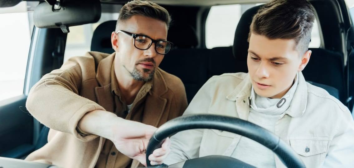 Parent and teenager practicing driving skills with Get Drivers Ed.