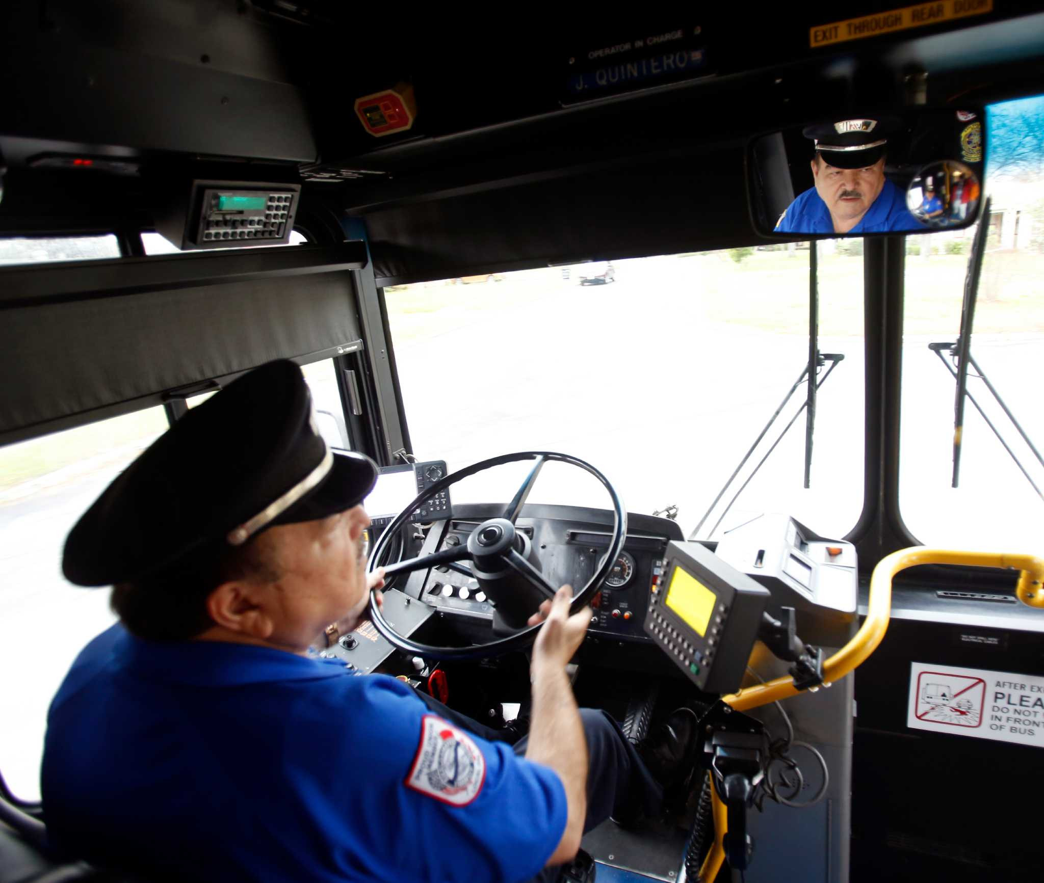 Bus driver confidently handling an emergency situation, trained through Get Drivers Ed.