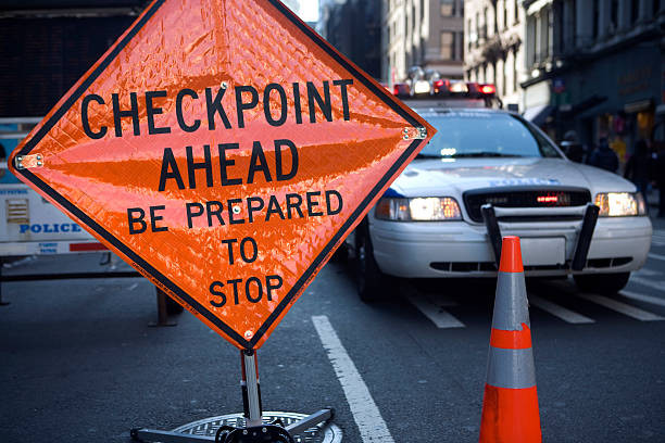 : Illustration of a road sign with "License Issues Ahead" text, representing the potential consequences of driving without a license in Texas.