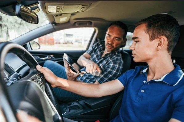 A parent and teen discussing their Texas Parent-Taught Drivers Ed journey with Get Drivers Ed, preparing for safe driving.