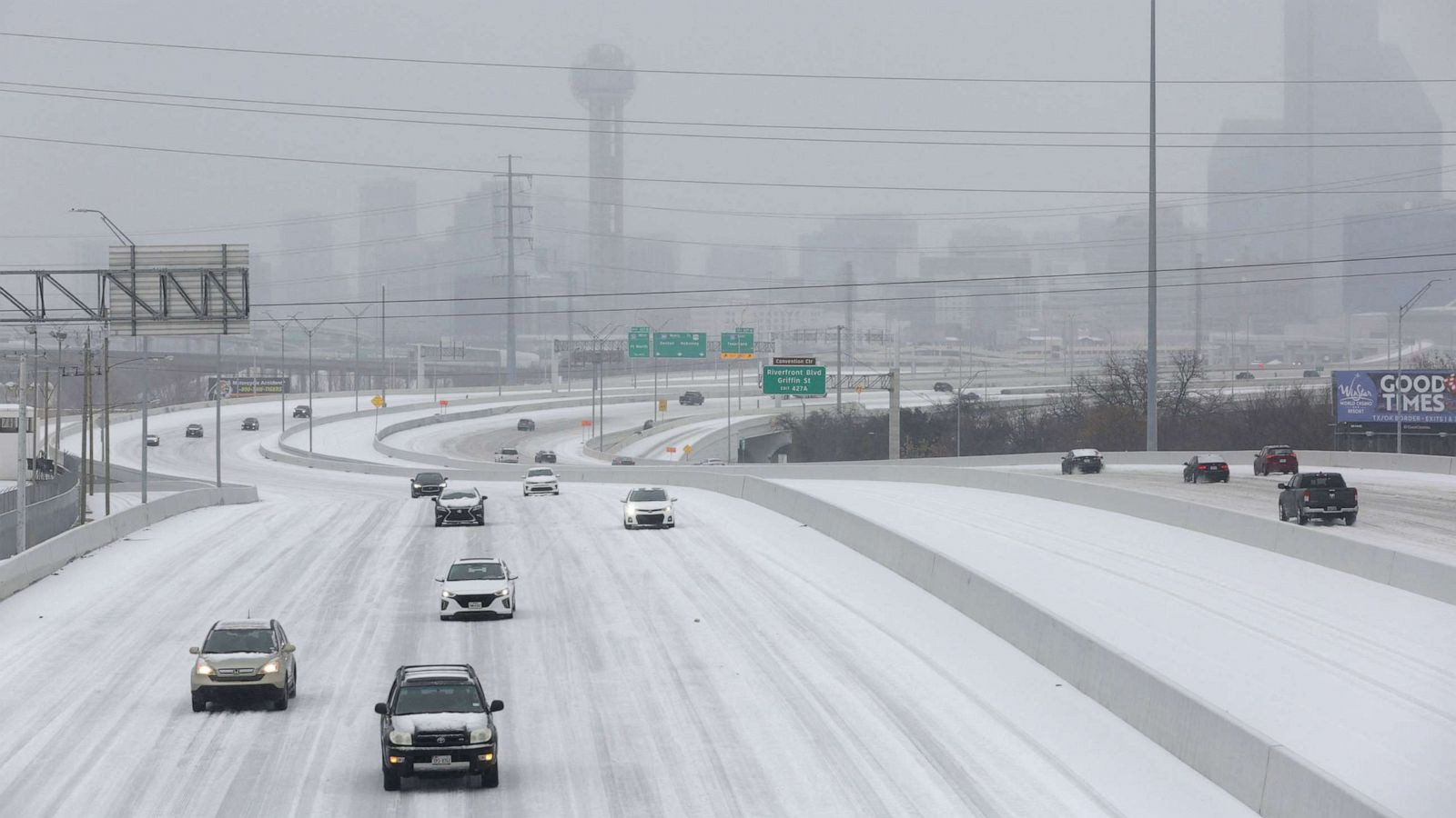 Driver safely navigating a stormy road, trained by Get Drivers Ed.