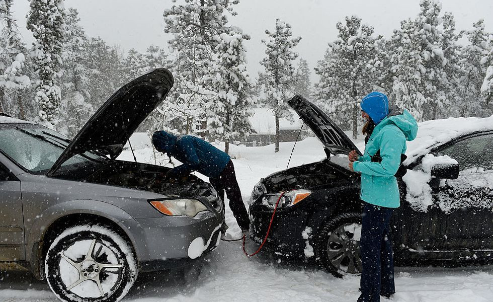 Car covered in snow demonstrating winter challenges, learn more with Get Drivers Ed.