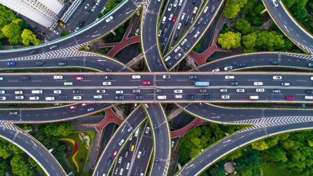 A focused driver maintaining lane discipline while navigating through traffic, highlighting the importance of safe and smooth driving.