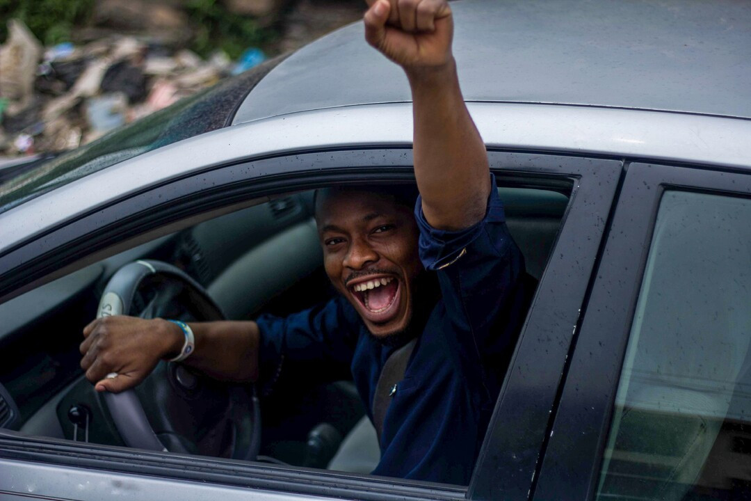 Adult learner practicing driving maneuvers with a Get Drivers Ed instructor in a safe driving environment.