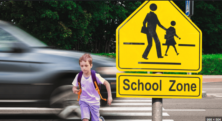 Instructor Demonstrating Safe School Zone Driving Techniques in Get Drivers Ed Course