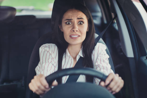 A calm and confident driver behind the wheel, symbolizing overcoming driving anxiety with Get Drivers Ed.