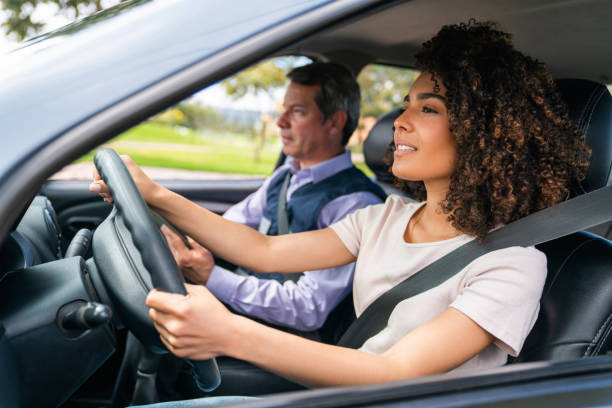 A car driving safely in different weather conditions, including rain, snow, fog, wind, and heat.