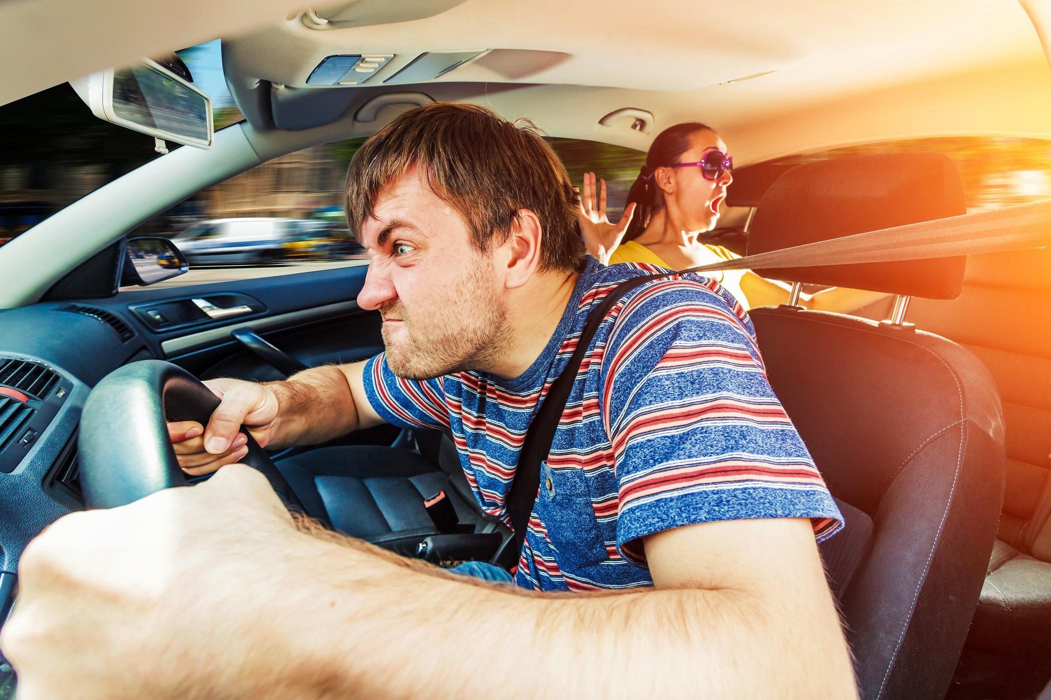 Driver practicing calm techniques behind the wheel, highlighting 'How Not to Become an Aggressive Driver' guidance from Get Drivers Ed