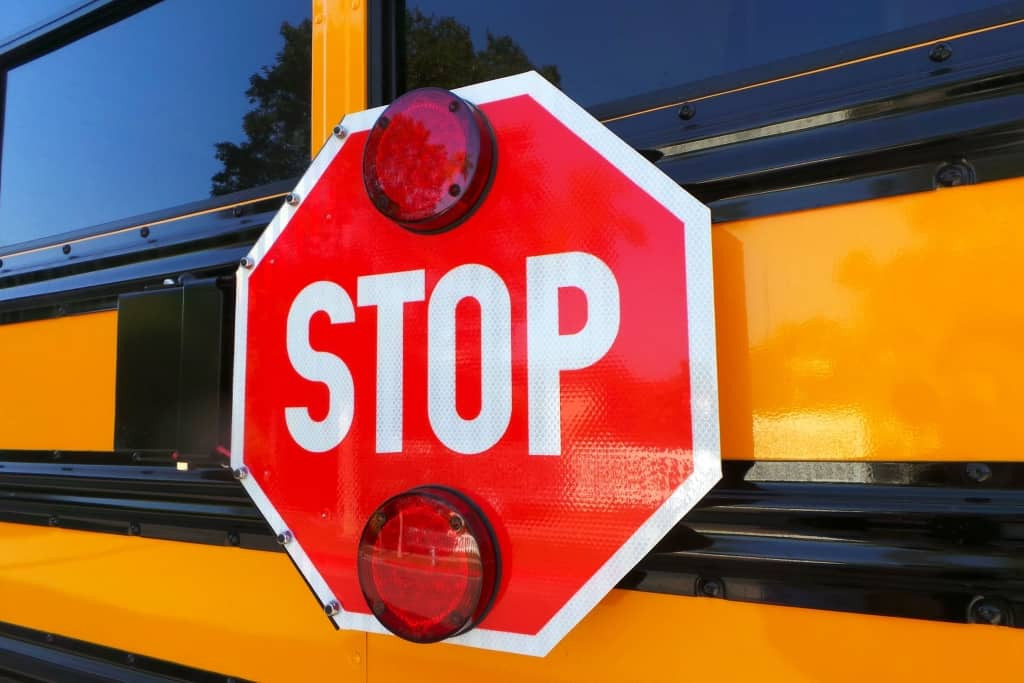 Driver Stopping for School Bus Stop Sign