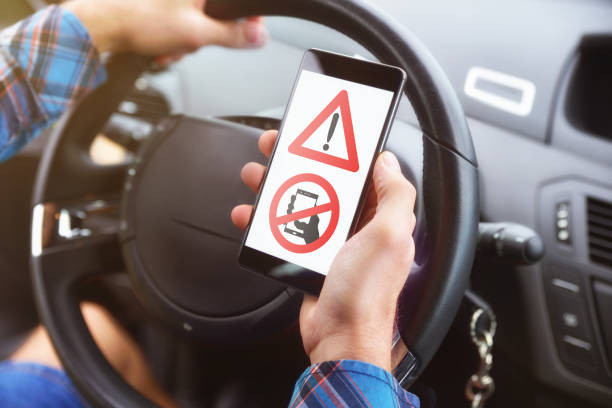 "Driver using a hands-free device while driving"