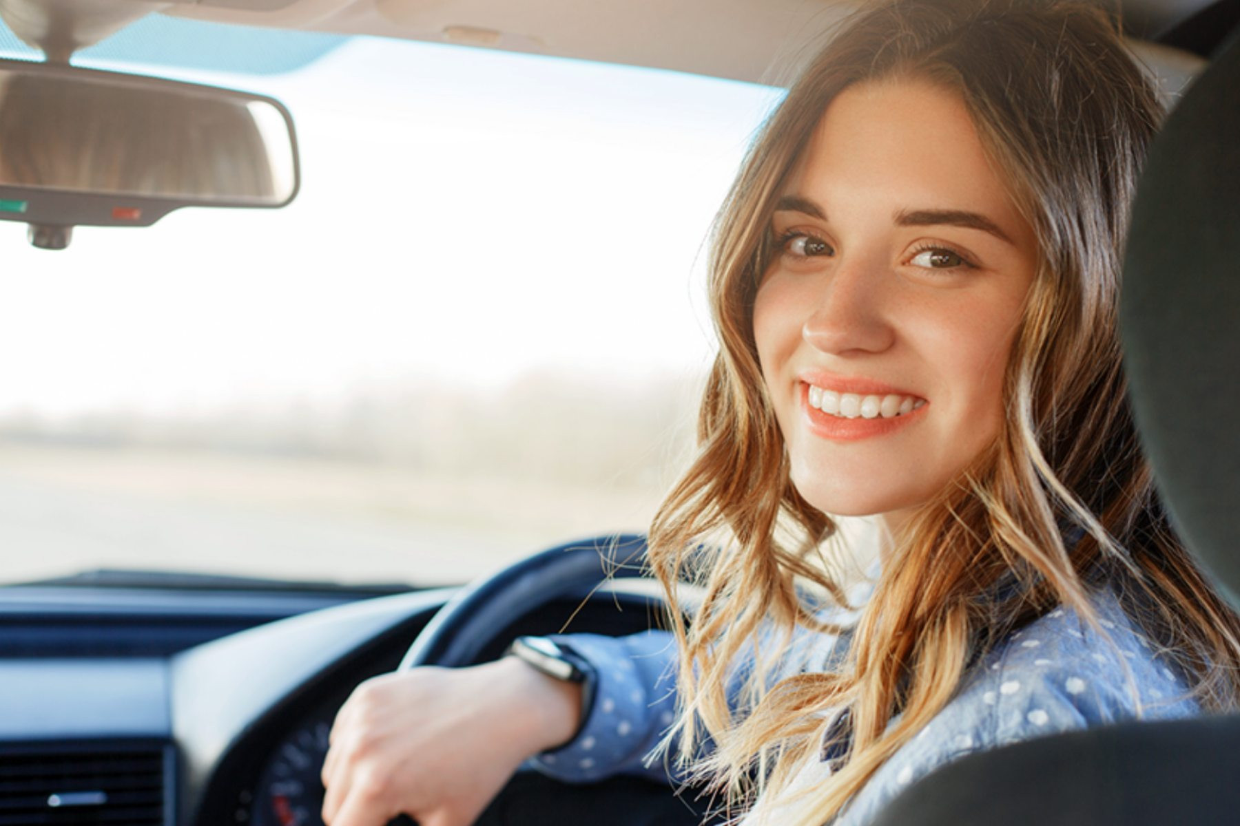 Driver Reflecting on Influences Behind the Wheel with Get Drivers Ed Course on Screen