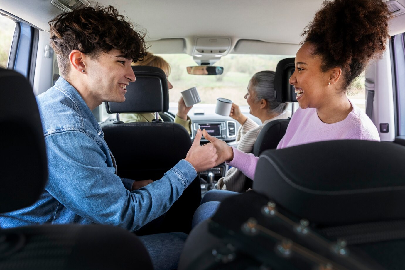 Teen driver behind the wheel practicing safe driving skills.