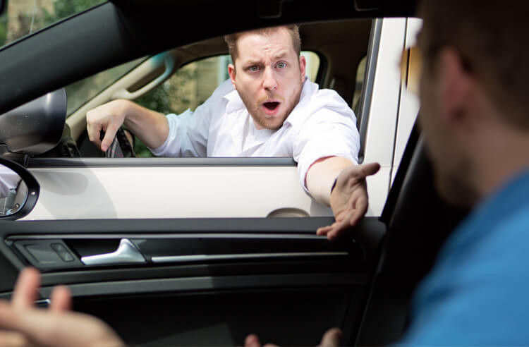 Driver maintaining calm and composed demeanor while navigating through traffic, demonstrating road rage prevention techniques from Get Drivers Ed.