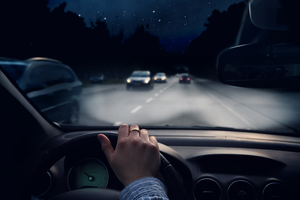 Car Headlights Illuminating Dark Road at Night - Get Drivers Ed