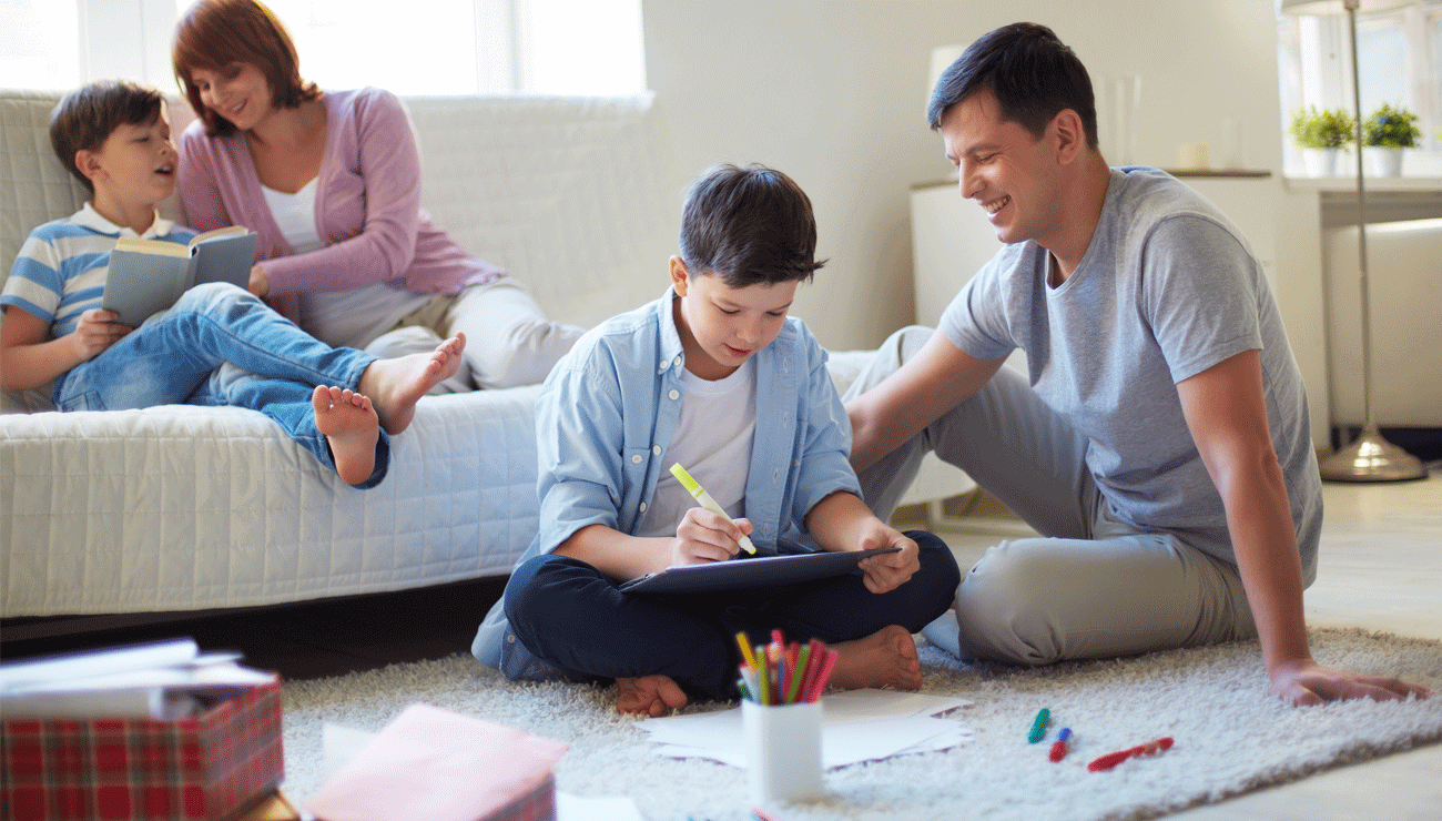 Parent and teen studying Get Drivers Ed material together, preparing for a driving lesson.