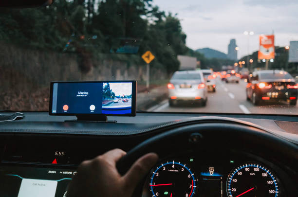 Driver signaling a turn with a car blinker in a residential area.