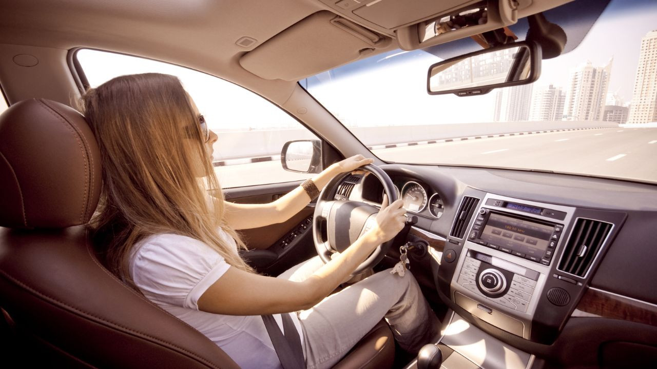 Confident Young Driver Behind the Wheel, Mastering Safe Driving Skills Through Get Drivers Ed’s Comprehensive Educational Guide.