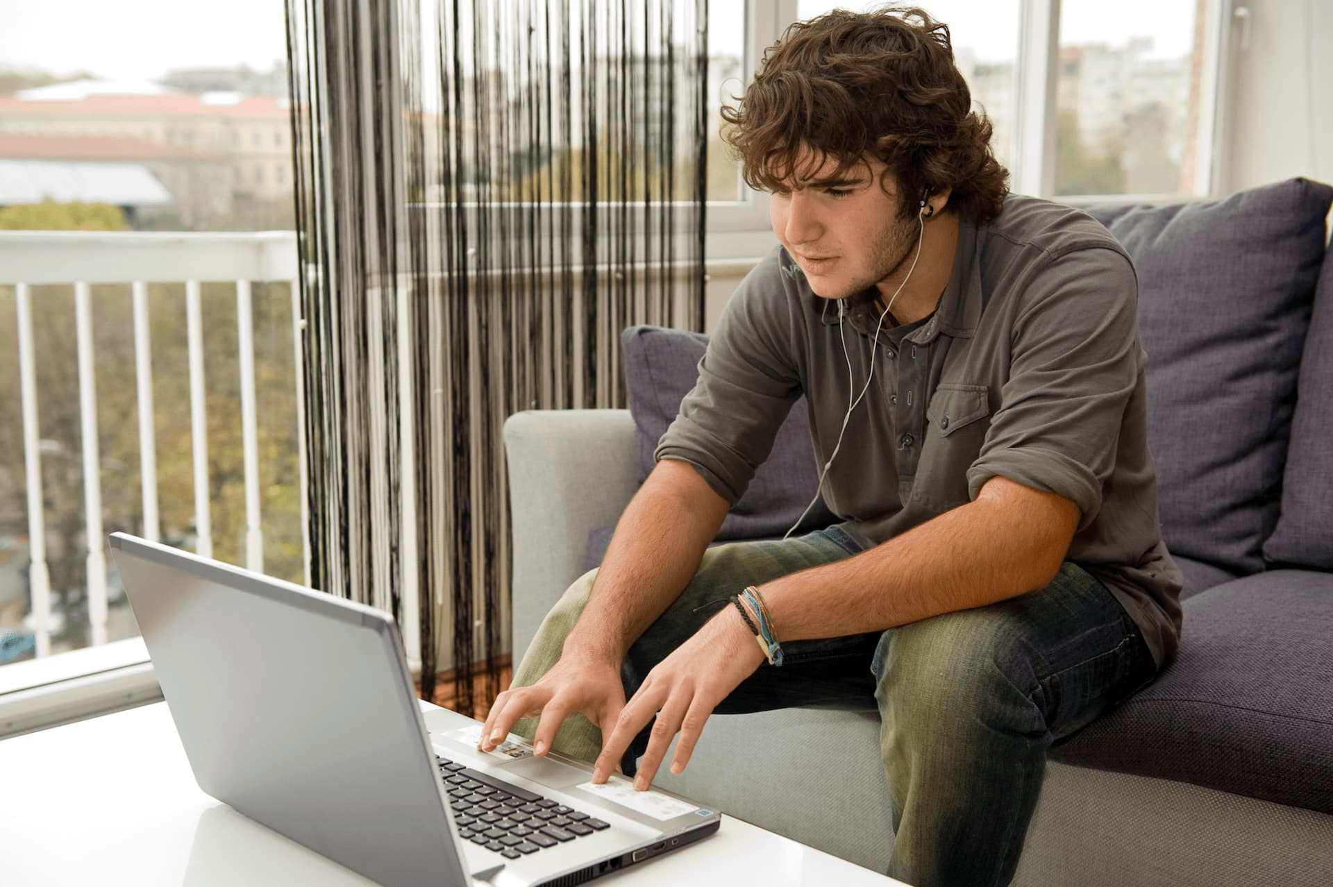 Adult Student Taking Online Driving Course with Get Drivers Ed on Their Laptop