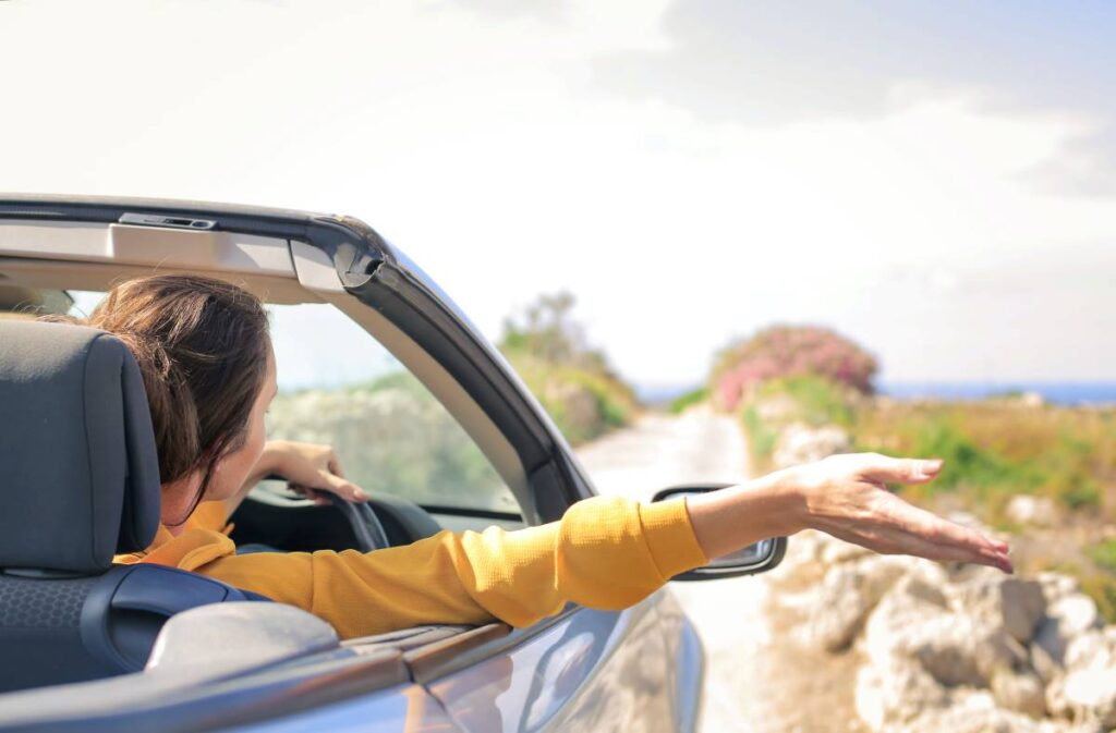 Driver confidently navigating a challenging road situation, trained by Get Drivers Ed.