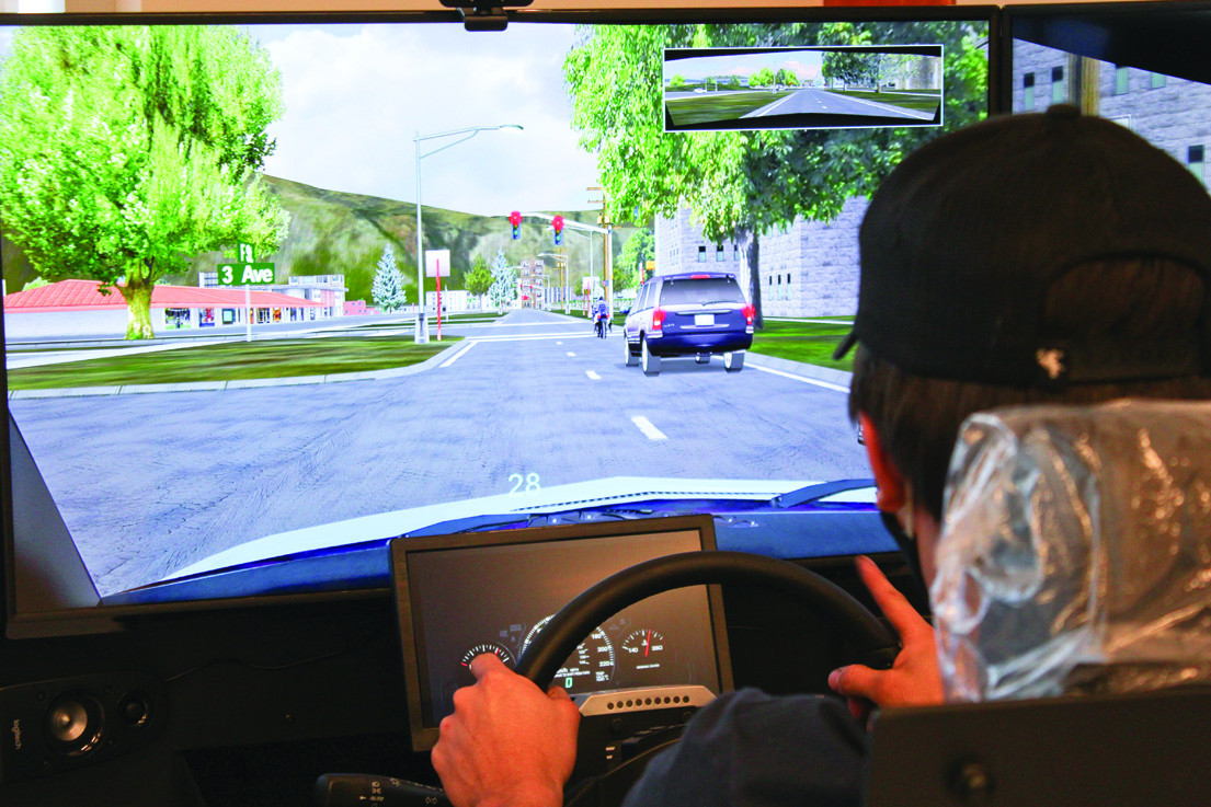 Student Learning Basic Driving Skills Online with Get Drivers Ed on Their Computer Screen