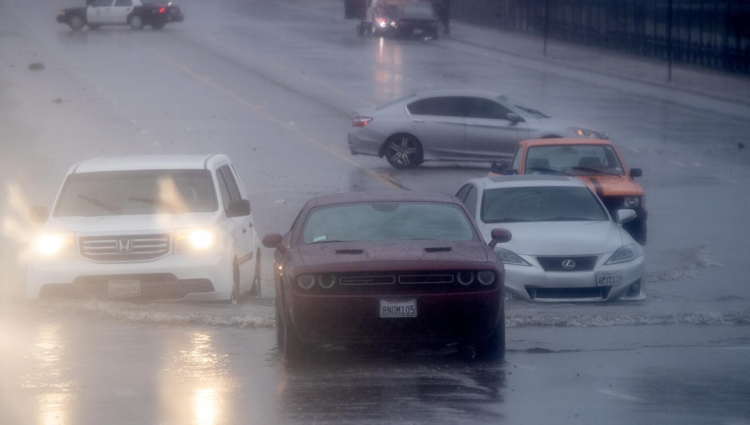 A car safely parked after driving through a flood, showcasing the importance of drivers ed knowledge by Get Drivers Ed.