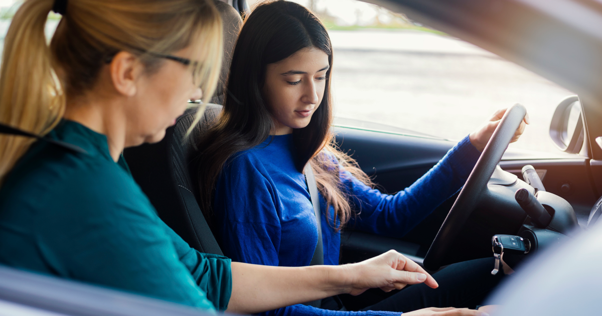 Teen Learning To Drive With Parent Guidance