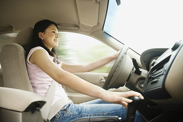 Teen learning to drive with instructor at Get Drivers Ed.