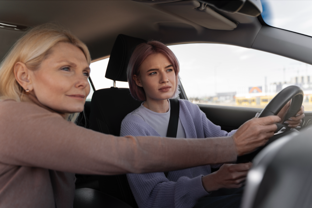 A parent teaching their teen to drive on a quiet road in Austin, Texas, as part of the Parent-Taught Driver Education program.